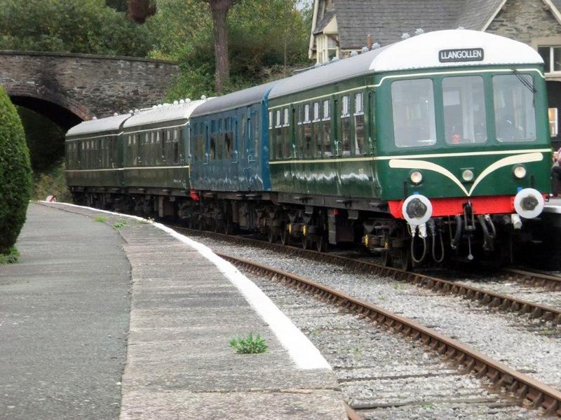 4-car unit comprising the hybrid class 104/108 and the class 1a08 at Carrog