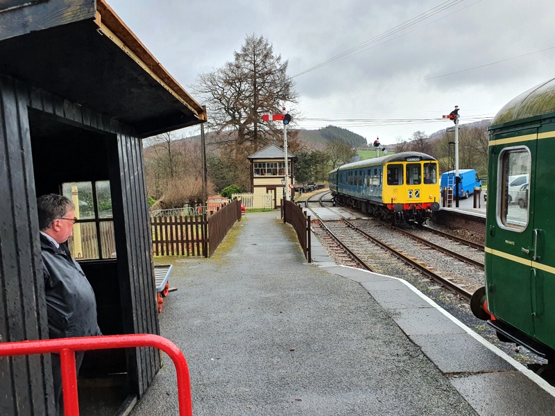 Class 109 and hybrid class 104/108 passing at Glynyfrdwy on 19/02/22
