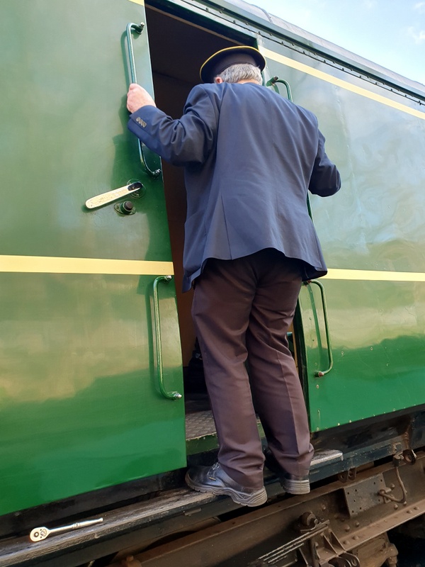 Class 109: A guard trying the recently-installed grab handles