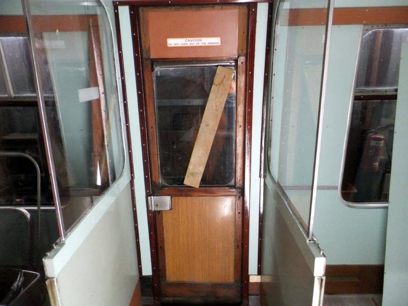 Class 105: The finished panels around the door in the rear vestibule