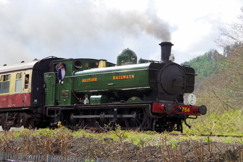 7754 passing Pentrefelin Yard on 13/04/25