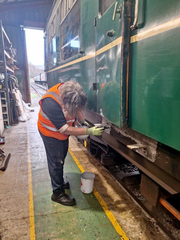 Class 127/108: Attending to some stepboard mounting brackets on 56223