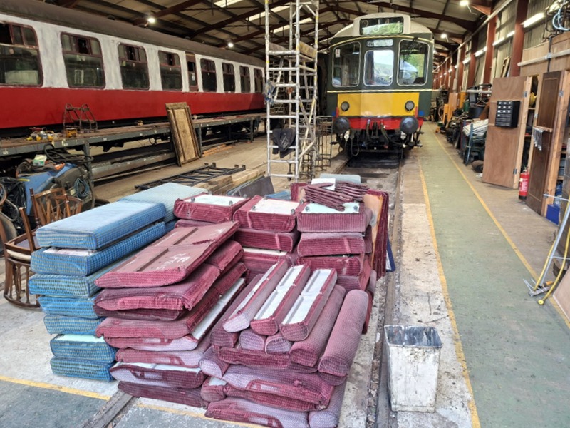 Class 110: Inside the shed along with some of its seat frames