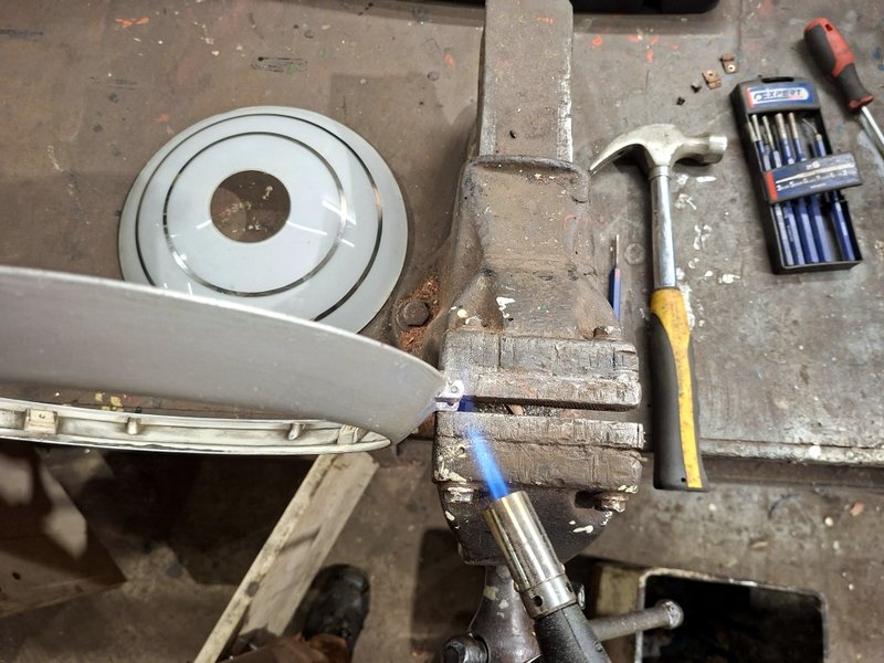 Class 110: Removing the remains of a sheared hinge pin from a saloon light